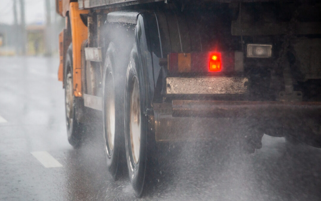 Are Trucks Legally Required to Slow Down in the Rain?
